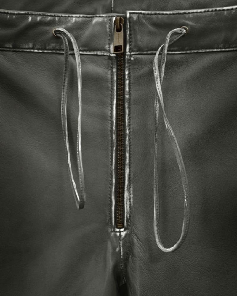 Sleek Rubbed Charcoal Leather Pants – Channel Ricky Martin’s Legendary Look