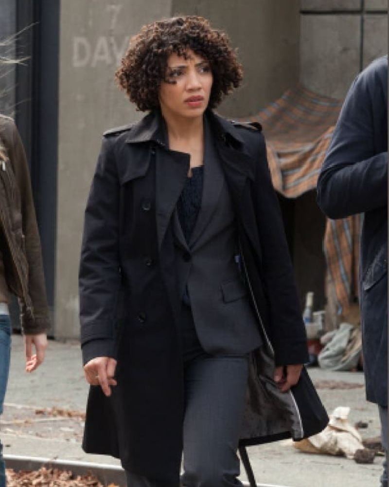 Astrid Farnsworth’s Signature Look – The Fringe Black Coat for Timeless Style